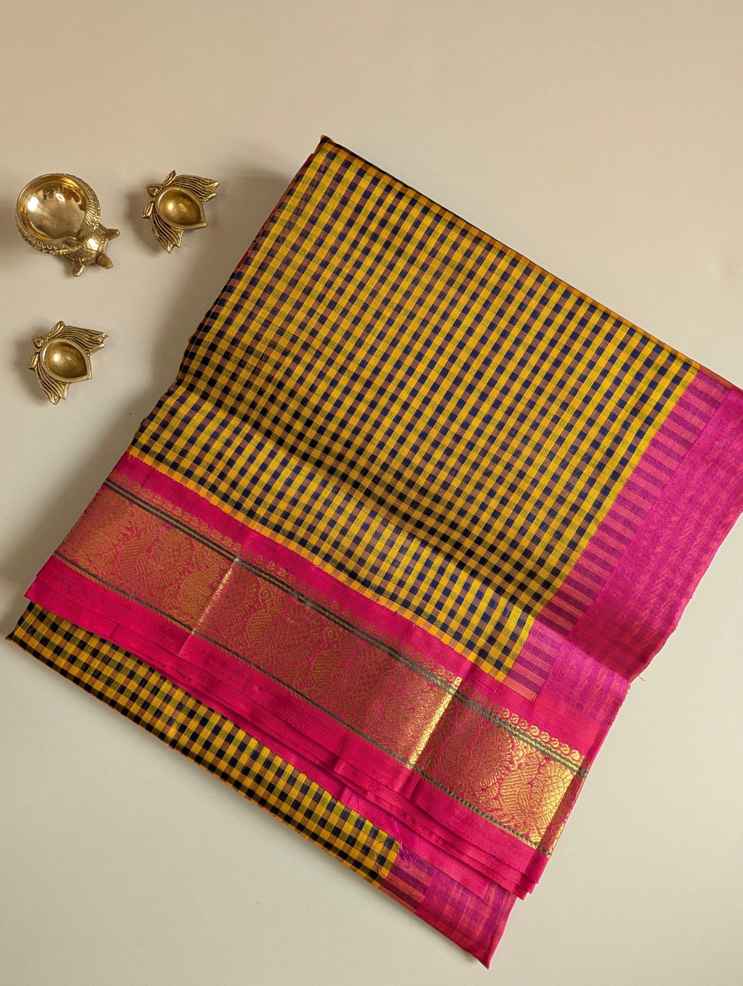 Yellow and black checks with pink peacock border