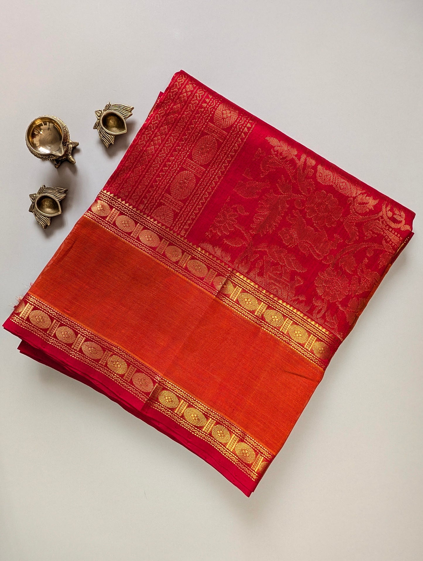 Red and orange animal motifs Pure kanchi silk cotton