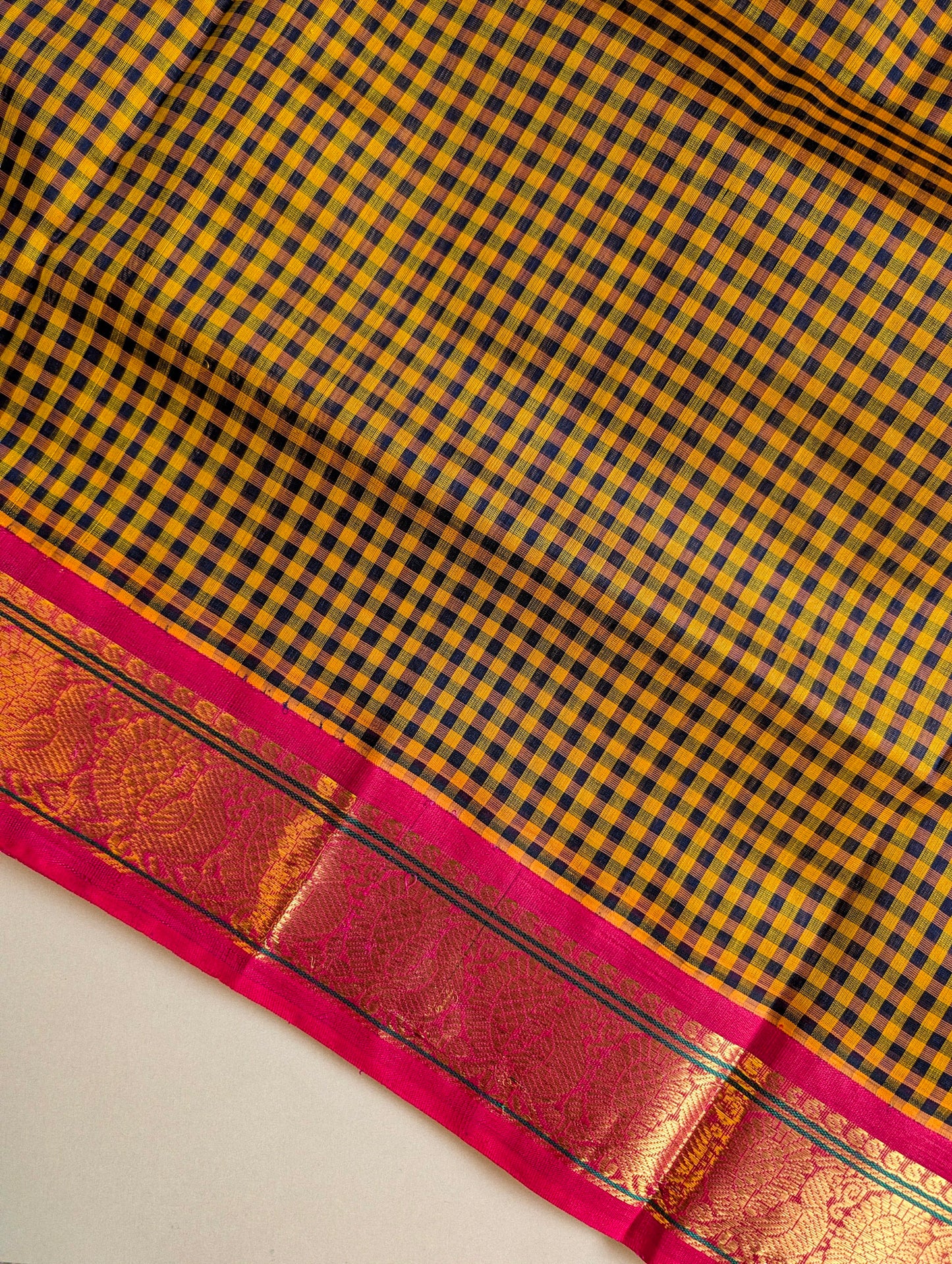 Yellow and black checks with pink peacock border