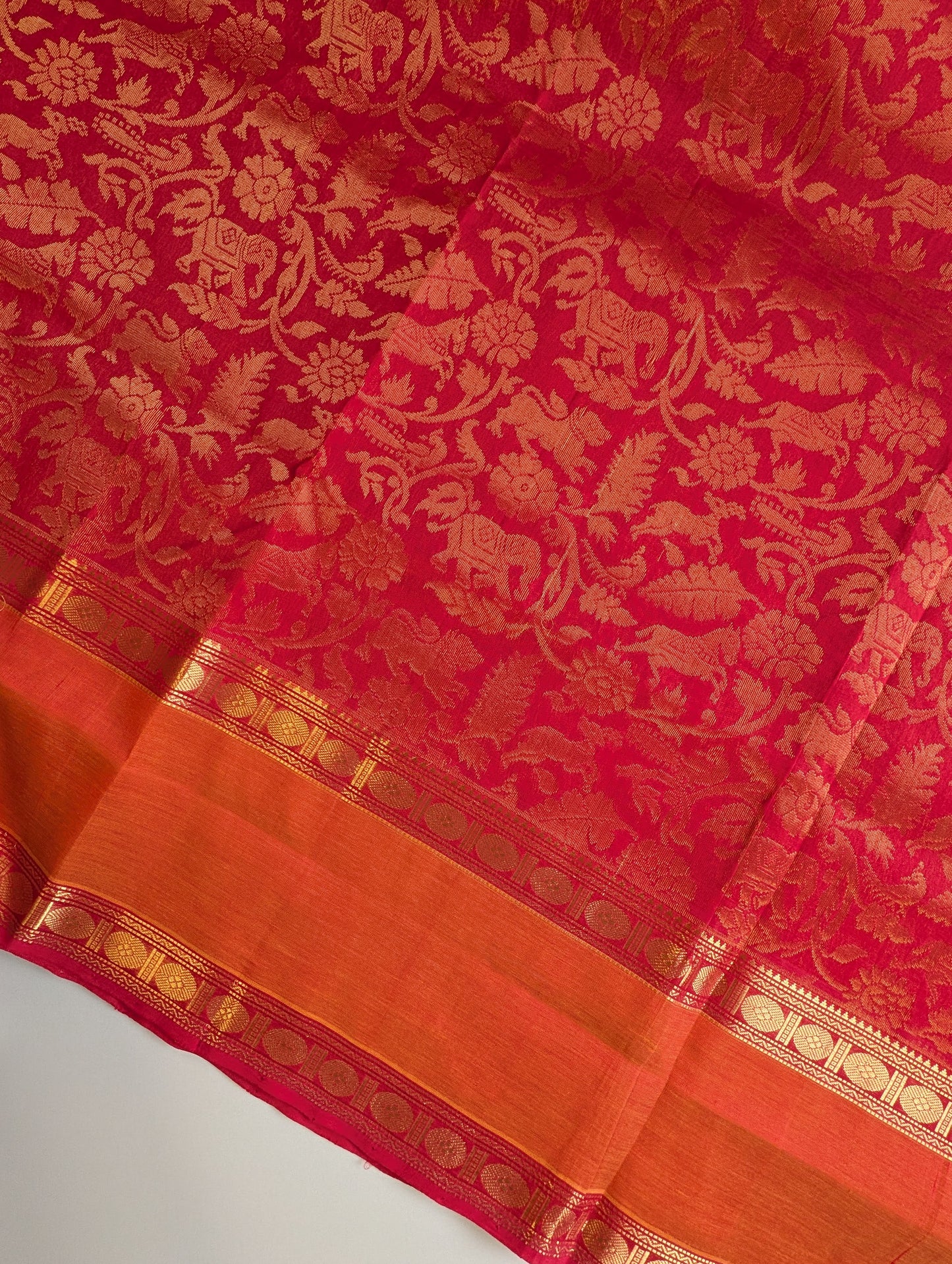 Red and orange animal motifs Pure kanchi silk cotton